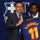 Barcelona's new player Ousmane Dembele (R) poses with his new jersey next to Barcelona's president Josep Maria Bartomeu at the Camp Nou stadium on August 28, 2017