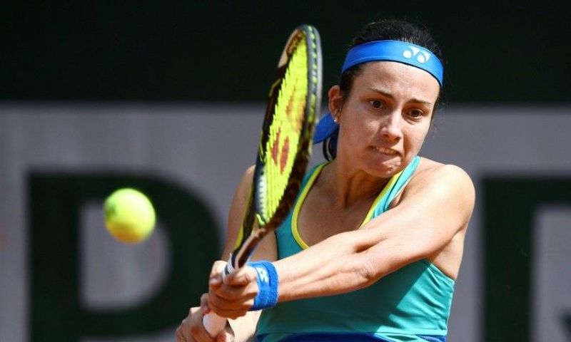Latvia's Anastasija Sevastova returns the ball to Croatia's Petra Martic during their tennis match at the Roland Garros 2017 French Open on June 4, 2017 in Paris