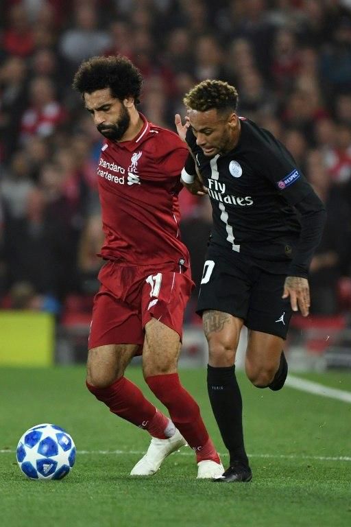 Mohamed Salah holds off Neymar during the last meeting of the clubs, at Anfield in September.