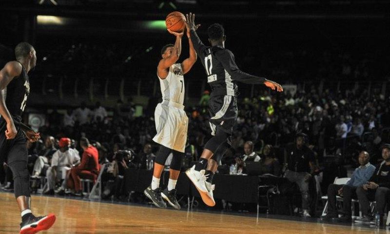 NBA player Kyle Lowry (L) shoots during the NBA Africa Game 2017 basketball match between Team Africa and Team World on August 5, 2017 in Johannesburg