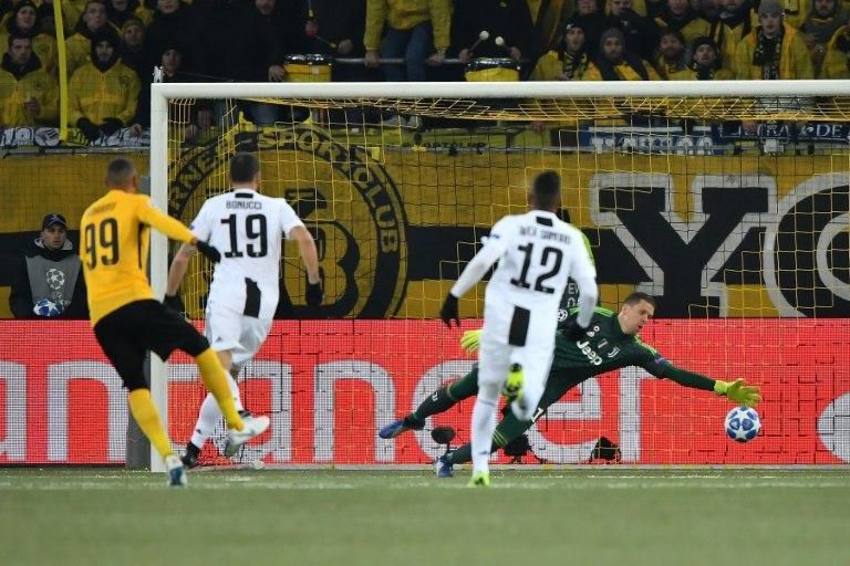 Young Boys' French forward Guillaume Hoarau (Far L) scores his team's second goal against Juventus.