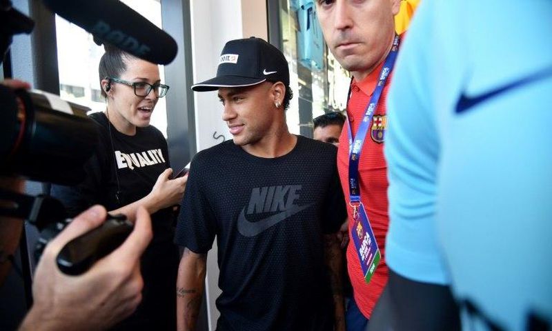 Barcelona's Brazilian forward Neymar takes part in a event organized by a sports shop in Miami, on July 28, 2017
