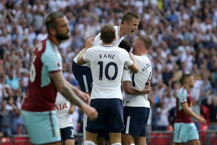 Tottenham Hotspur's Dele Alli celebrates with teammates after scoring a goal during their English Premier League match against Burnley, at Wembley Stadium in London, on August 27, 2017