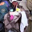 Russian officials said the 10-month-old boy had been saved thanks to being in a cradle and warmly wrapped up