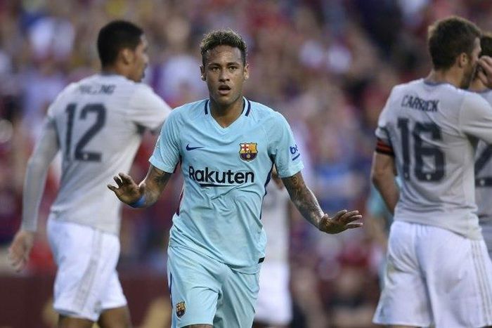 Barcelona's Neymar celebrates after scoring a goal during their International Champions Cup (ICC) friendly match against Manchester United, at the FedExField in Landover, Maryland, on July 26, 2017