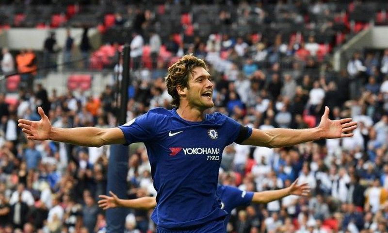 Chelsea's defender Marcos Alonso celebrates after he scored their second goal against Tottenham Hotspur on August 20, 2017