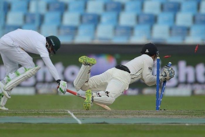 Kiwi wicketkeeper BJ Watling runs out Pakistani batsman Azhar Ali for 81