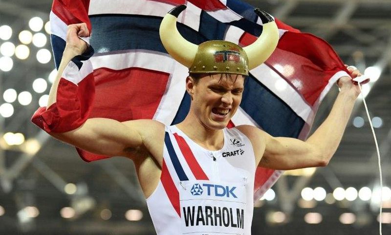 Norway's Karsten Warholm celebrates after winning the final of the men's 400m hurdles athletics event at the 2017 IAAF World Championships at the London Stadium in London on August 9, 2017