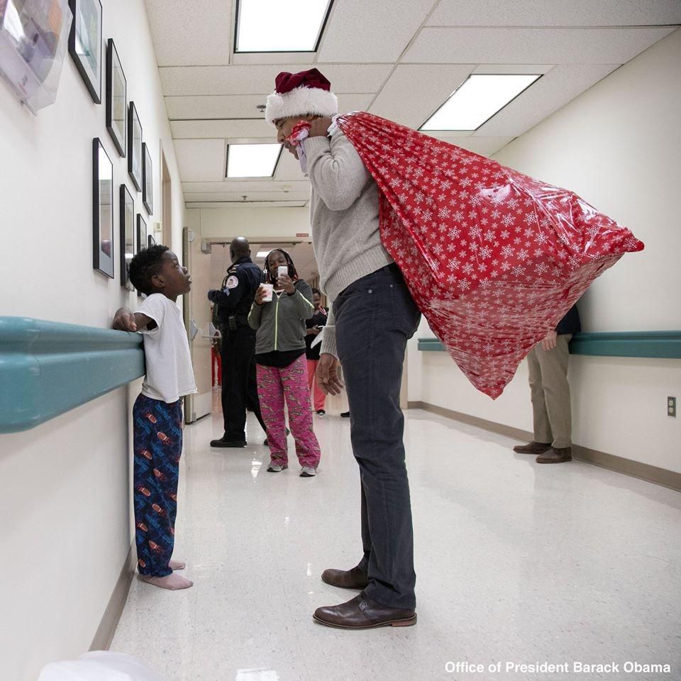 Former US President, Barack Obama pays surprise visit to hospital with Christmas gifts