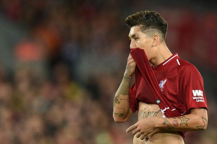 Liverpool's Brazilian midfielder Roberto Firmino (pictured December 2, 2018) helped his team make a comeback at Burnley after the hosts took an unexpected lead