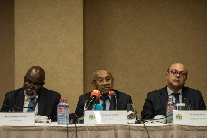 Confederation of African Football officials Amaju Pinnink (L), president Ahmad Ahmad and Essadik Alaoui in Accra last month after Cameroon were stripped of the right to host the 2019 Africa Cup of Nations