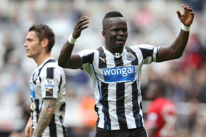 Late Ivory Coast midfielder Cheick Tiote (right) in action for Newcastle United in 2013