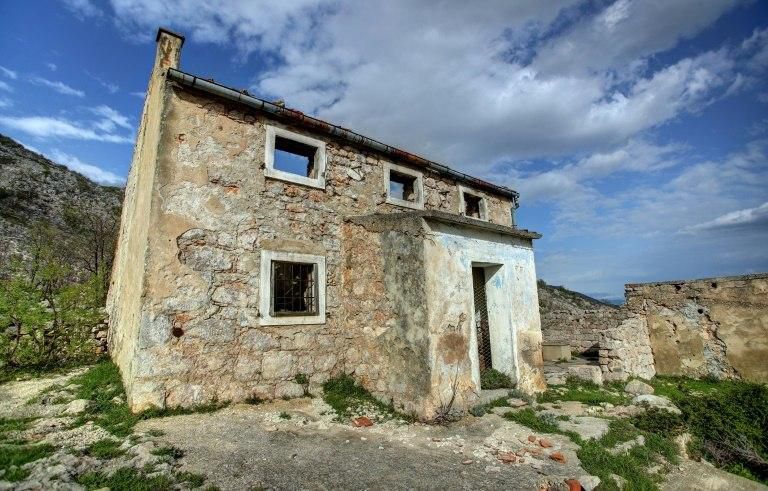 The burned-out shell of a stone cottage where Croatia's World Cup captain Luka Modric spent part of his childhood