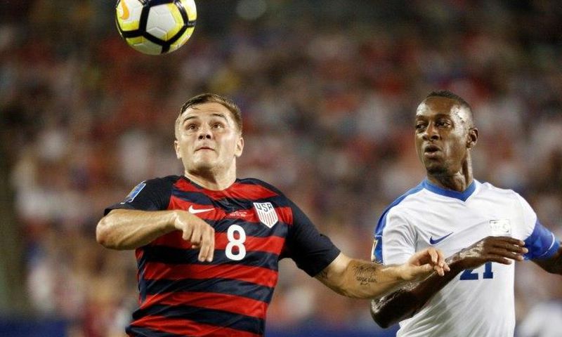 Jordan Morris (L) scores twice to give the united States a 3-2 win over Martinique in the CONCACAF Gold Cup in Tampa, Florida