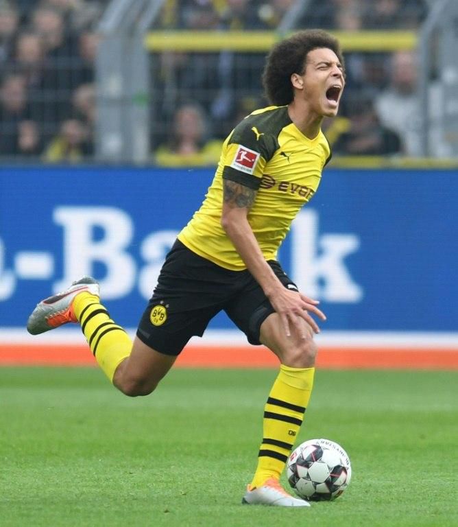 Belgium midfielder Axel Witsel is expected to be fit for league leaders Borussia Dortmund at home to Freiburg despite limping off with cramp in the mid-week goalless draw at home to Brugge.