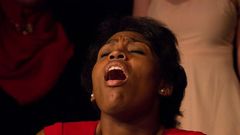A woman with an expression of orgasm.