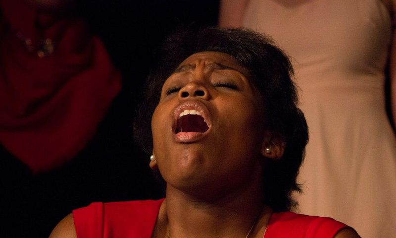 A woman with an expression of orgasm.
