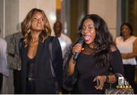 Minister of Tourism shows of skin in gorgeous black dress