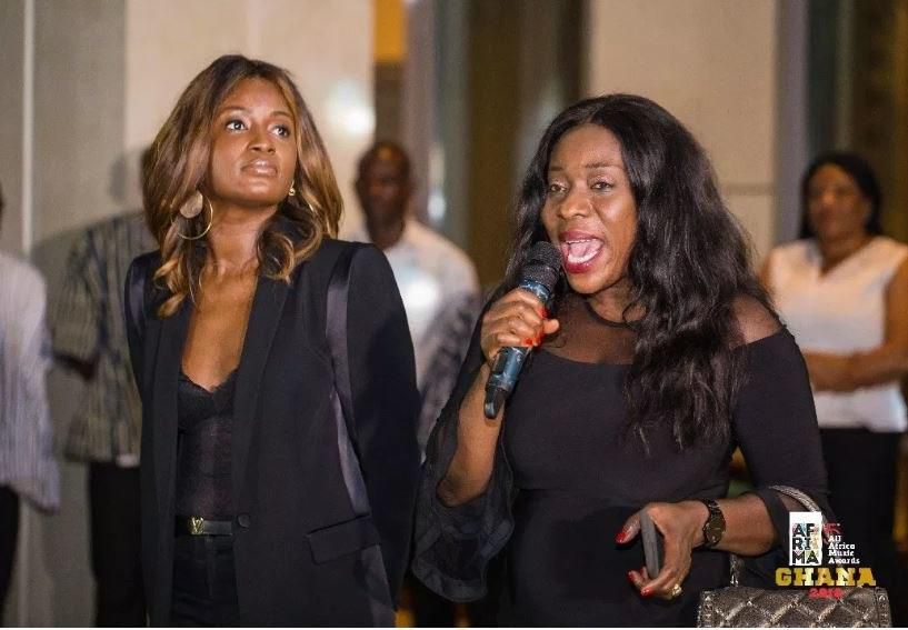 Minister of Tourism shows of skin in gorgeous black dress