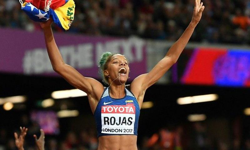 Venezuela's Yulimar Rojas celebrates her victory in the final of the women's triple jump at the 2017 IAAF World Championships in London on August 7, 2017