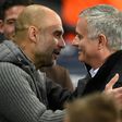 Pep Guardiola's Manchester City are outspending Manchester United, managed by Jose Mourinho (right)