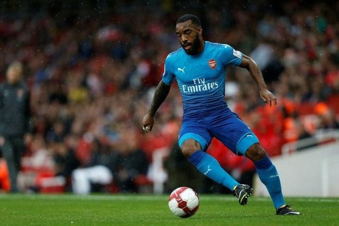 Arsenal's French striker Alexandre Lacazette controls the ball during the pre-season friendly match between Arsenal and Benfica at The Emirates Stadium in north London on July 29, 2017
