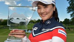 Ryu So-Yeon of South Korea celebrates with the trophy after winning the Walmart NW Arkansas Championship, at Pinnacle Country Club in Rogers, Arkansas, on June 25, 2017