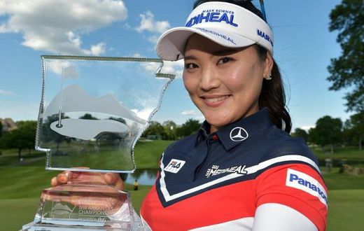 Ryu So-Yeon of South Korea celebrates with the trophy after winning the Walmart NW Arkansas Championship, at Pinnacle Country Club in Rogers, Arkansas, on June 25, 2017