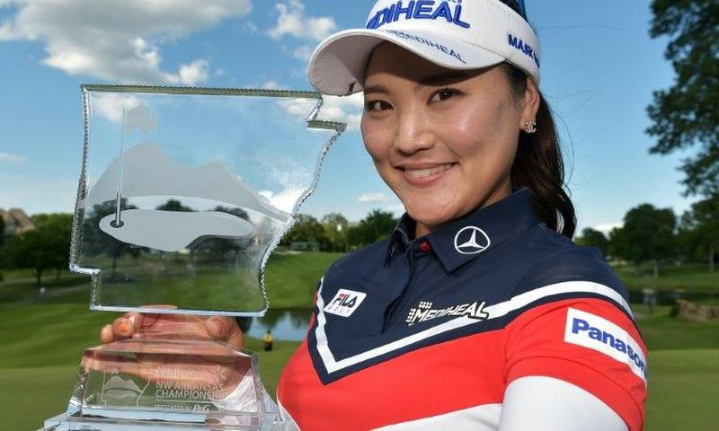Ryu So-Yeon of South Korea celebrates with the trophy after winning the Walmart NW Arkansas Championship, at Pinnacle Country Club in Rogers, Arkansas, on June 25, 2017