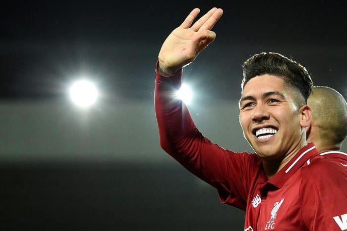 Three and easy: Roberto Firmino scored a hat-trick as Liverpool thrashed Arsenal 5-1