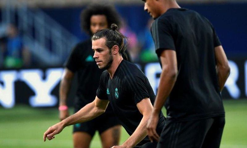 Real Madrid's forward Gareth Bale warms up on August 7, 2017