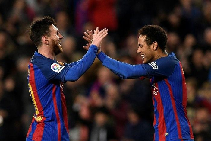 Barcelona's forward Lionel Messi (L) celebrates with Barcelona's forward Neymar (R) after scoring a goal during the Spanish league football match against Celta de Vigo March 4, 2017