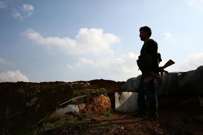 A Turkish-backed Syrian fighter in the village of Tal Malid, in the north of Aleppo province on December 22, 2018