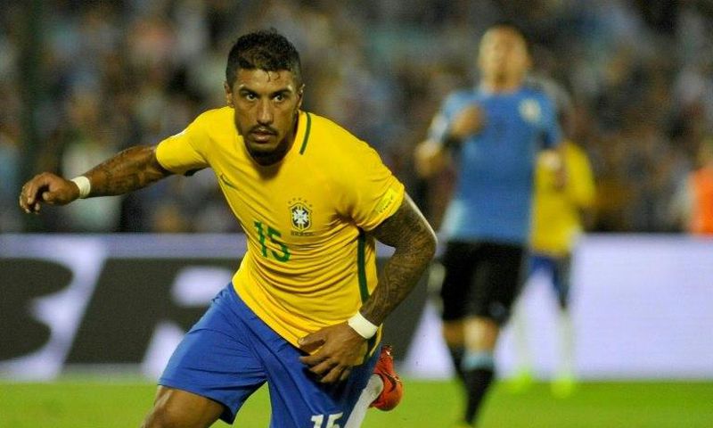 Brazil midfielder Paulinho has joined Barcelona from Chinese club Guangzhou Evergrande