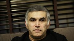 (FILES) In this file photo taken on November 2, 2014 Bahraini human rights activist Nabeel Rajab sits at his home in the village of Bani Jamrah, west of Manama
