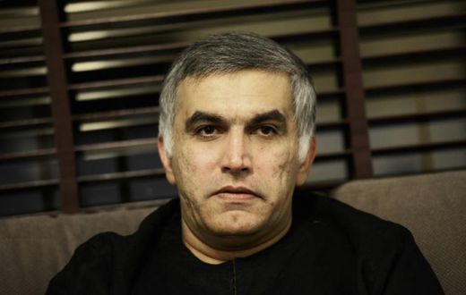 (FILES) In this file photo taken on November 2, 2014 Bahraini human rights activist Nabeel Rajab sits at his home in the village of Bani Jamrah, west of Manama