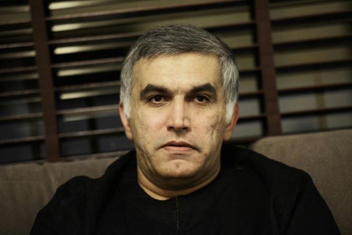 (FILES) In this file photo taken on November 2, 2014 Bahraini human rights activist Nabeel Rajab sits at his home in the village of Bani Jamrah, west of Manama