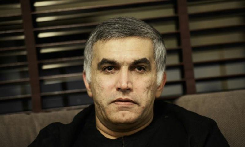 (FILES) In this file photo taken on November 2, 2014 Bahraini human rights activist Nabeel Rajab sits at his home in the village of Bani Jamrah, west of Manama