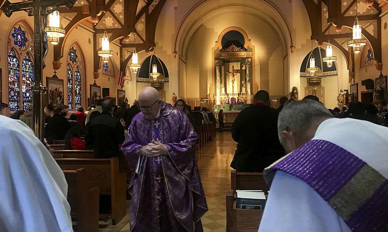 Priest Who Was Still Saying Mass After Abuse Settlements Is Suspended