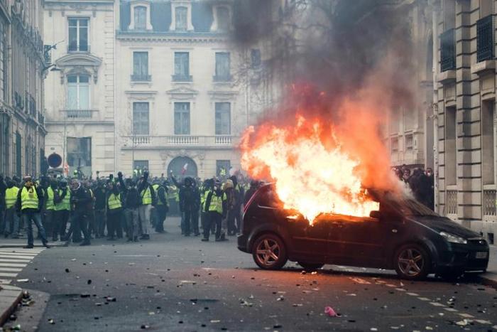 France is in the throes of mass demonstrations, forcing President Emmanuel Macron to beat a hasty retreat