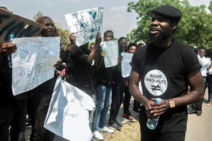 Hip-hop artist Chama "Pilato" Fumba, pictured at the demonstration in September