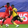 Canada winger Alphonso Davies (L) has started training with Bayern Munich, but the 18-year-old wunderkind is not expected to make his Budesliga debut until January at the earliest.