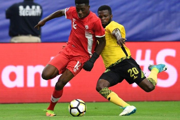 Canada winger Alphonso Davies (L) has started training with Bayern Munich, but the 18-year-old wunderkind is not expected to make his Budesliga debut until January at the earliest.