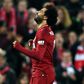 Eyeing history: Mohamed Salah celebrates as Liverpool beat Newcastle 4-0 to open up a six-point Premier League lead