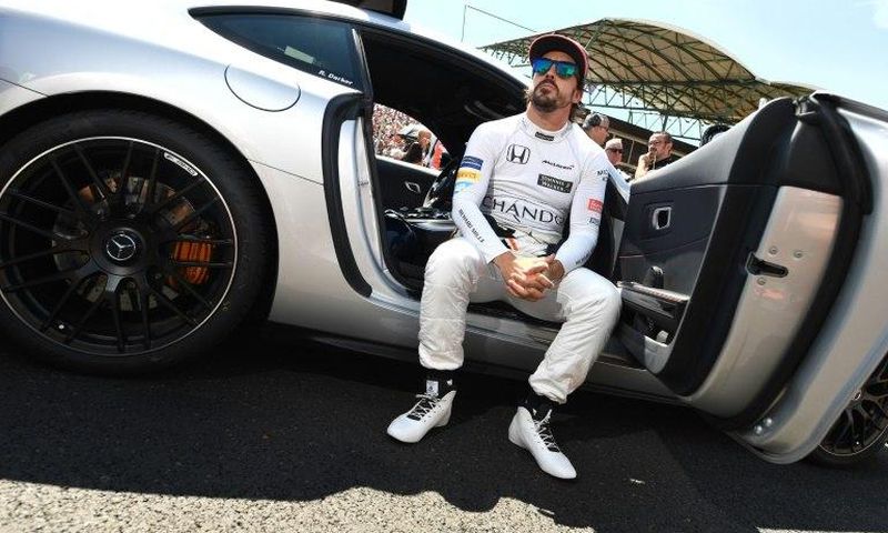 McLaren's Spanish driver Fernando Alonso waits for the start of the race at the Hungaroring racing circuit in Budapest on July 30, 2017