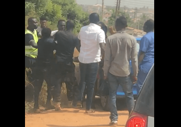 Security personnel assaulting Uber driver