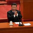 China's President Xi Jinping vowed to press ahead with economic reforms but made clear that Beijing will not deviate from its one-party system or take orders from any other country