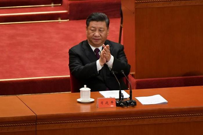 China's President Xi Jinping vowed to press ahead with economic reforms but made clear that Beijing will not deviate from its one-party system or take orders from any other country