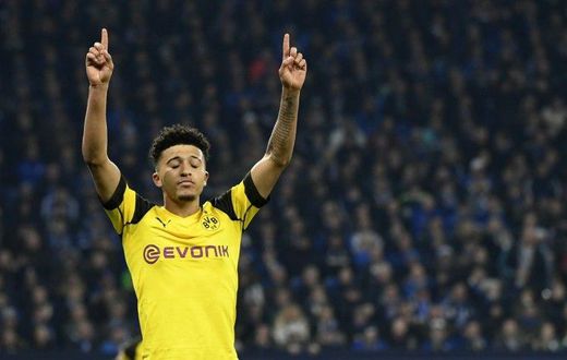 Borussia Dortmund winger Jadon Sancho celebrates after scoring the winning goal in Saturday's 2-1 derby win at rivals Schalke.