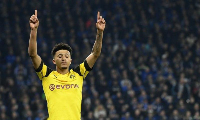 Borussia Dortmund winger Jadon Sancho celebrates after scoring the winning goal in Saturday's 2-1 derby win at rivals Schalke.
